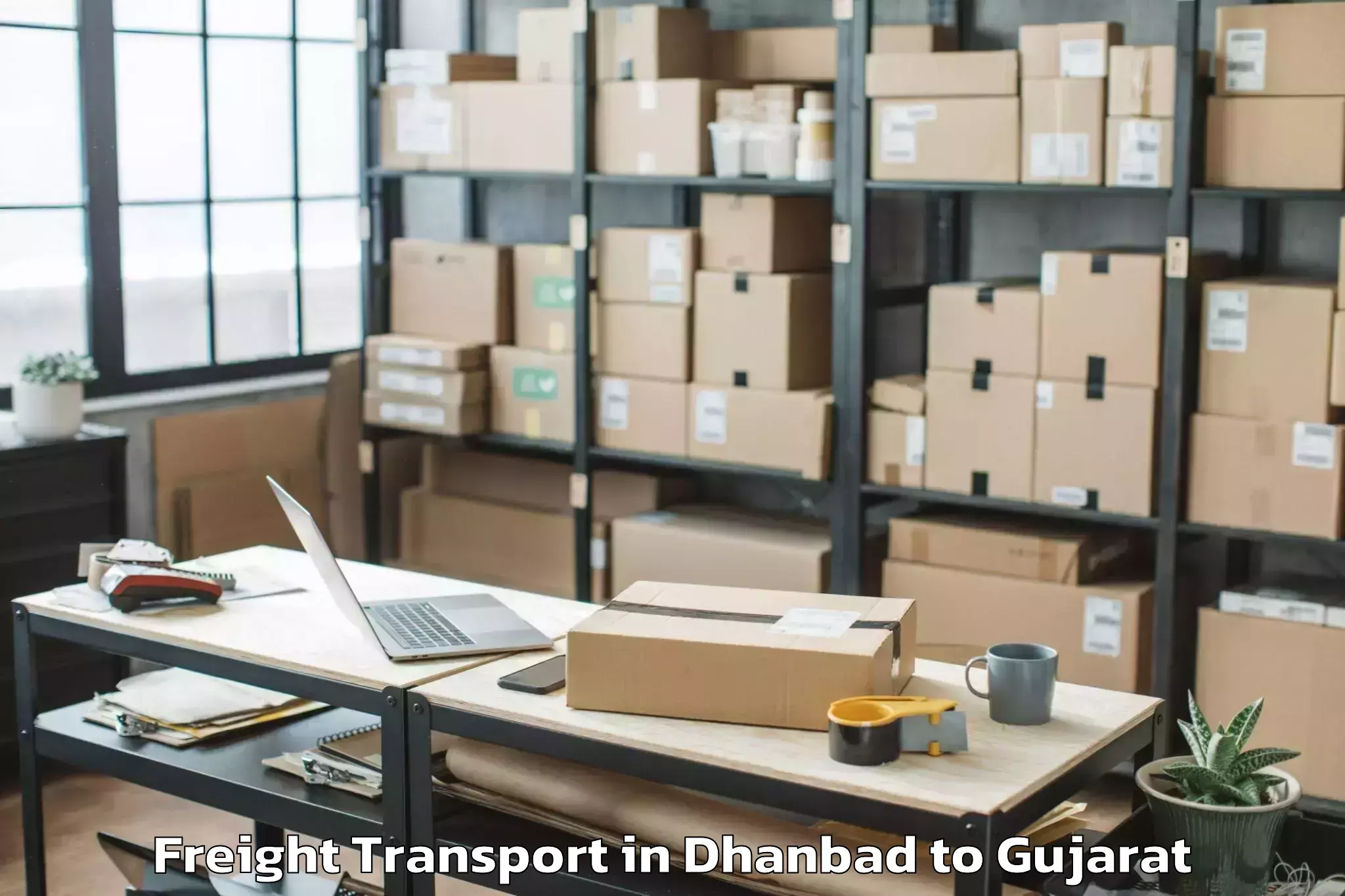 Top Dhanbad to Bedi Freight Transport Available